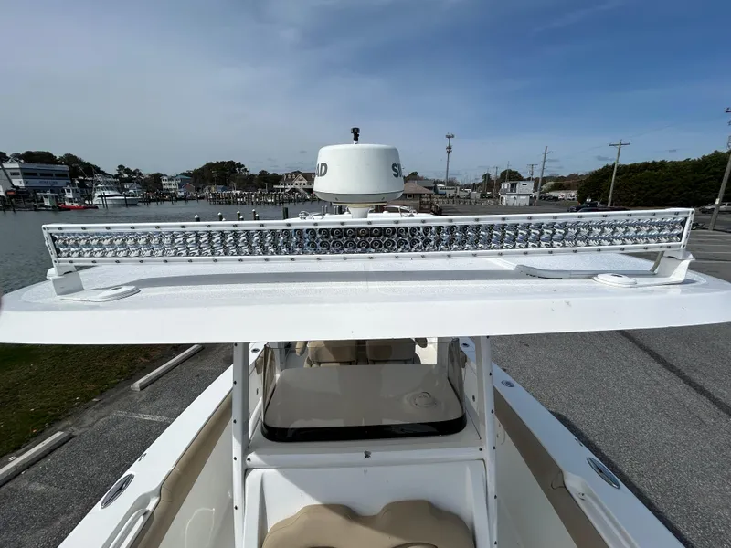Slide: The Image of 2015 Sea Hunt Gamefish 30 with Coffin Box, featuring a rooftop light bar. - 22
