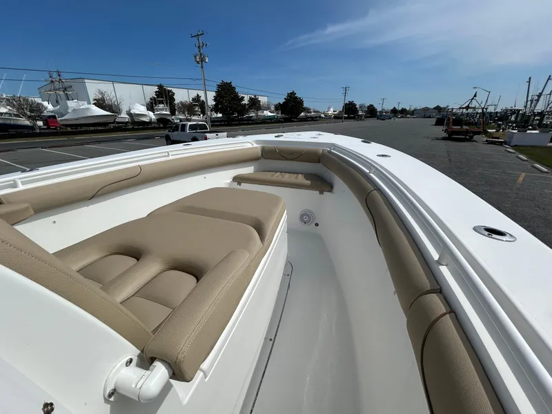 Slide: The Image of 2015 Sea Hunt Gamefish 30 with Coffin Box, featuring spacious seating and sleek design. - 24