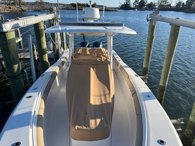 Slide: The Image of 2015 Sea Hunt Gamefish 30 with Coffin Box docked by the water. - 26