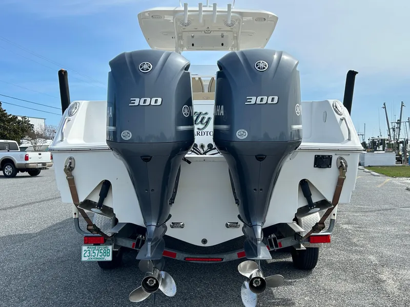 Slide: The Image of 2015 Sea Hunt Gamefish 30 with twin Yamaha 300 engines, rear view. - 4