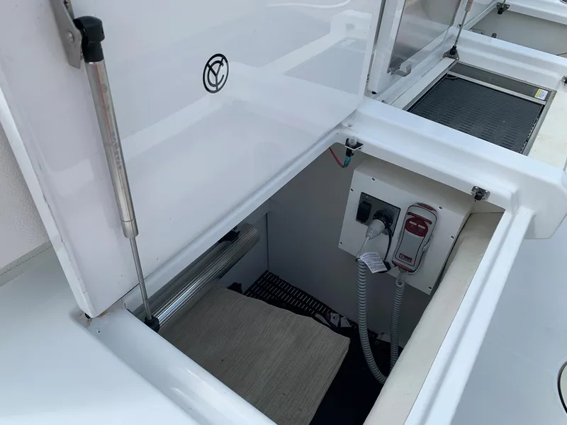 Slide: The Image of Open storage compartment on 2019 Cruisers Yachts 42 Cantius boat. - 22