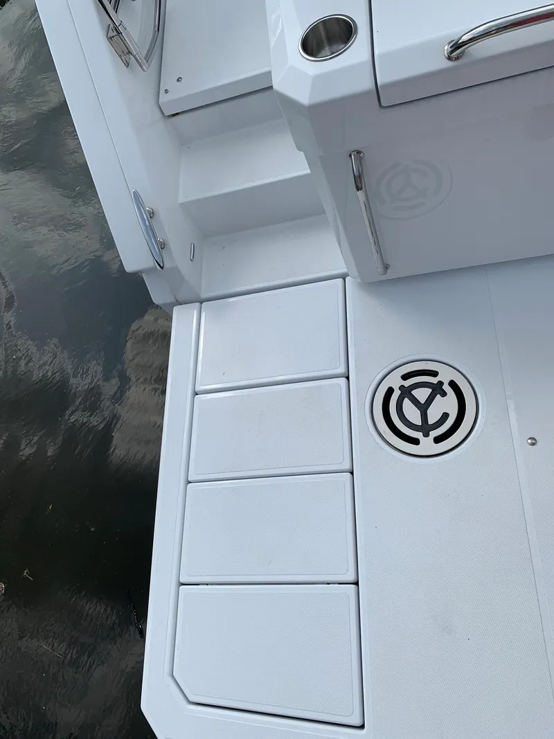 Slide: The Image of 2019 Cruisers Yachts 42 Cantius swim platform with sleek design and logo detail. - 23