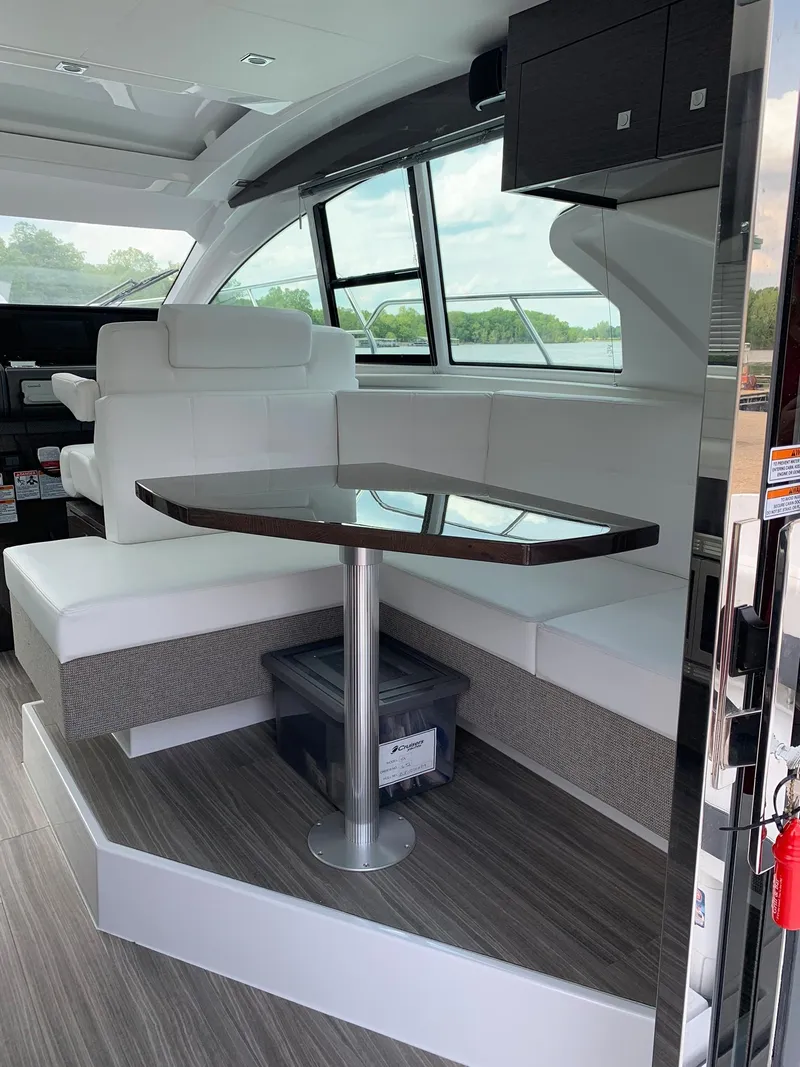 Slide: The Image of Interior of 2019 Cruisers Yachts 42 Cantius with sleek dining area and modern design. - 26
