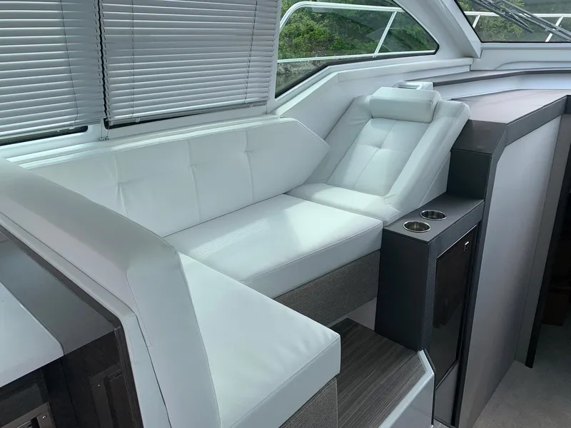 Slide: The Image of 2019 Cruisers Yachts 42 Cantius interior with white leather seating and modern design. - 30