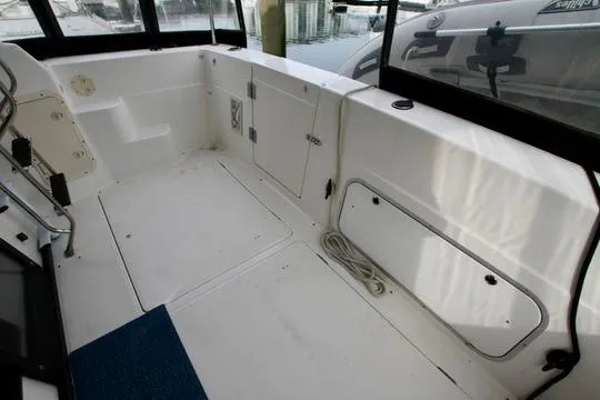 Slide: The Image of 1996 Bayliner 3788 Command Bridge Motoryacht interior deck with storage compartments. - 10