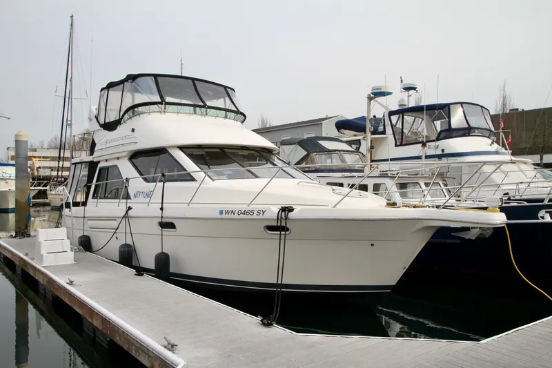 Slide: The Image of Bayliner 3788 Command Bridge Motoryacht 1996 docked at marina. - 2
