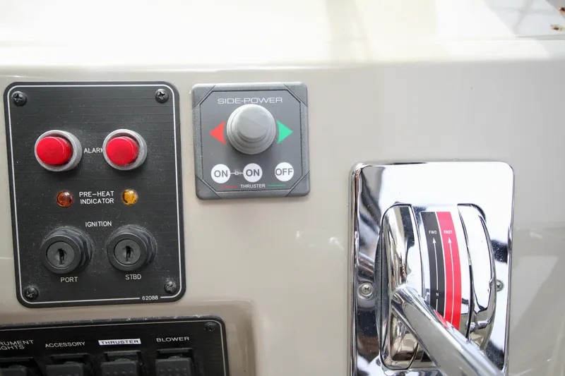 Slide: The Image of Control panel of a 1996 Bayliner 3788 Command Bridge Motoryacht with throttle and switches. - 33