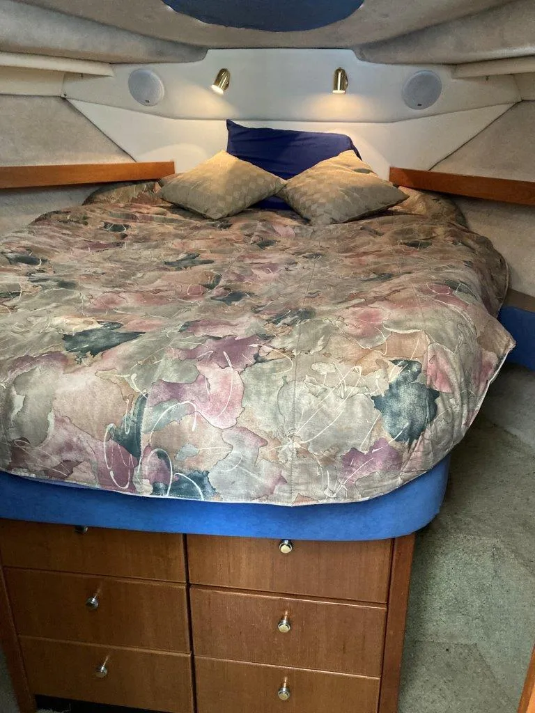 Slide: The Image of Cozy bedroom in 1996 Bayliner 3788 Command Bridge Motoryacht with floral bedding. - 39