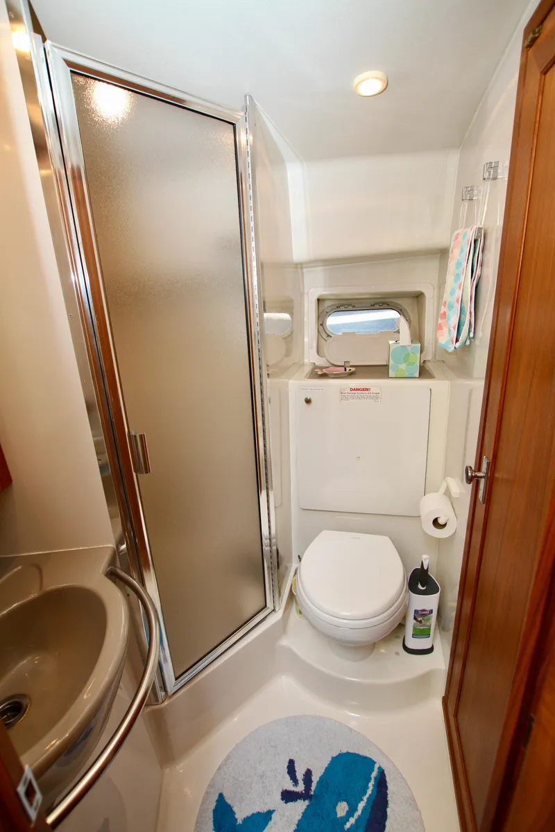 Slide: The Image of Bathroom interior of 1996 Bayliner 3788 Command Bridge Motoryacht with shower and marine toilet. - 41