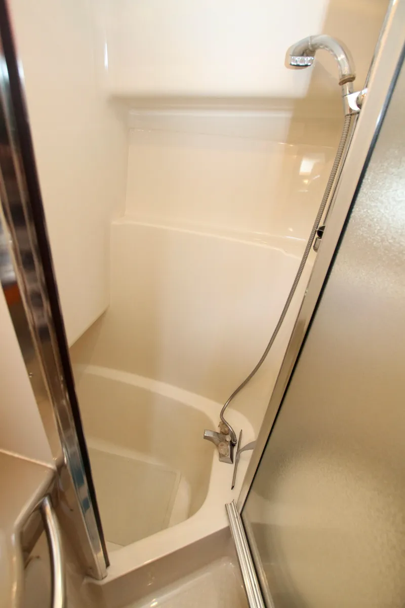 Slide: The Image of Shower area in 1996 Bayliner 3788 Command Bridge Motoryacht, featuring a sleek design. - 42