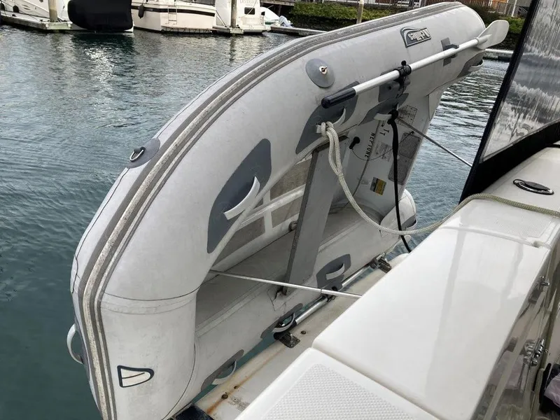 Slide: The Image of Inflatable dinghy attached to a 1996 Bayliner 3788 Command Bridge Motoryacht. - 9