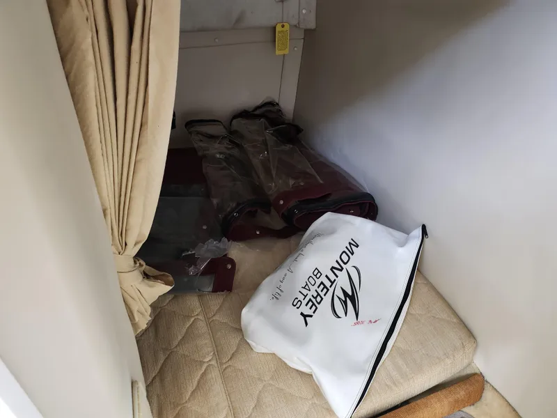 Slide: The Image of Interior storage space of 2007 Monterey 250 Cruiser with Monterey-branded bag. - 24