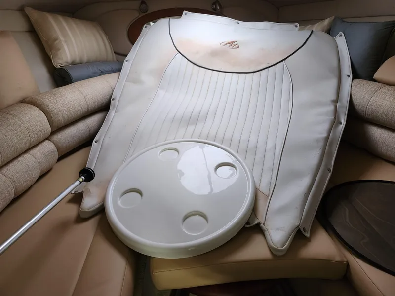 Slide: The Image of Interior of 2007 Monterey 250 Cruiser with cushions and table top. - 26