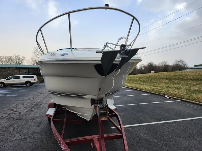 Slide: The Image of 2007 Monterey 250 Cruiser boat on trailer in parking lot. - 6
