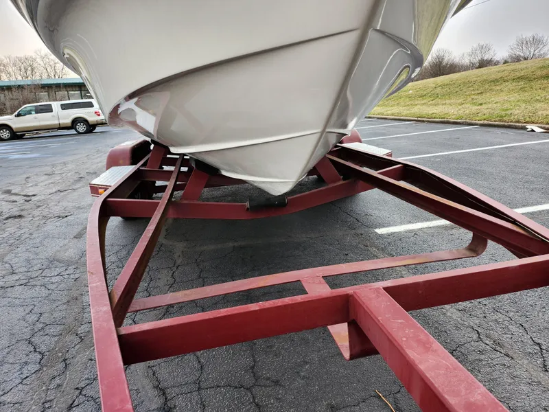 Slide: The Image of 2007 Monterey 250 Cruiser on red trailer in parking lot. - 7