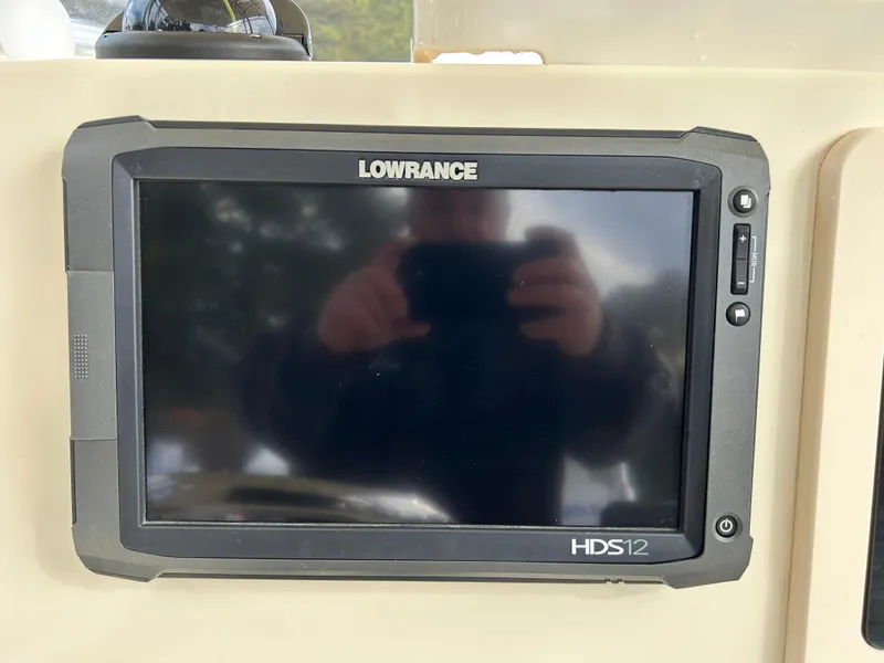 Slide: The Image of Lowrance HDS12 marine display on Parker 23 Special Edition, 2012 model. - 16