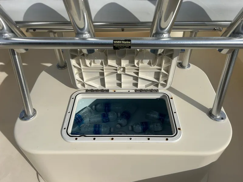 Slide: The Image of Built-in cooler on Parker 23 Special Edition boat, filled with water bottles. - 8
