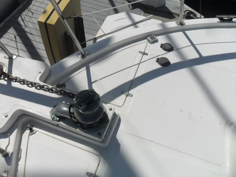 Slide: The Image of 1986 Symbol Yachtfisher deck with winch and chain detail. - 37