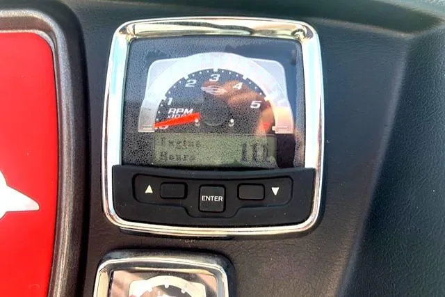 Slide: The Image of RPM gauge on 2010 Chaparral Sunesta 224 boat dashboard. - 7