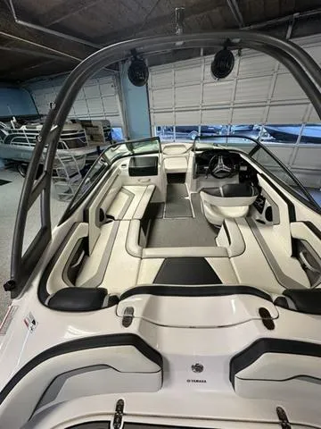 Slide: The Image of 2018 Yamaha Boats AR195 interior with sleek seating and modern design. - 7