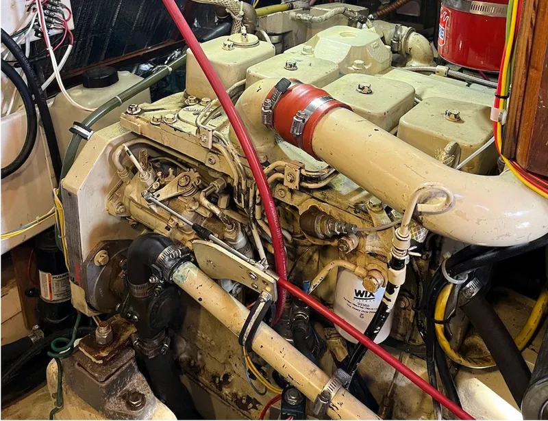 Slide: The Image of Engine of a 1987 Lord Nelson 37 Victory Tug, showcasing intricate mechanical components. - 28