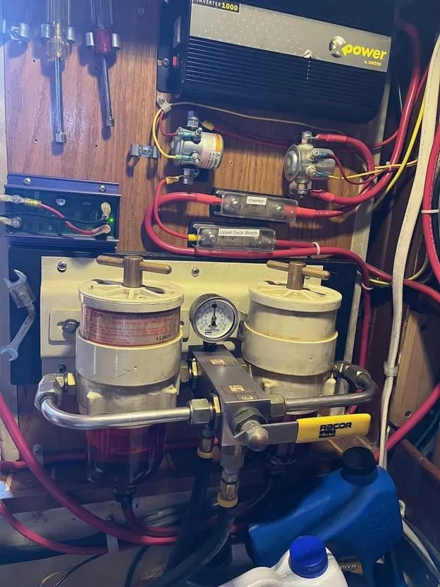 Slide: The Image of Engine room of 1987 Lord Nelson 37 Victory Tug with fuel filters and wiring. - 29