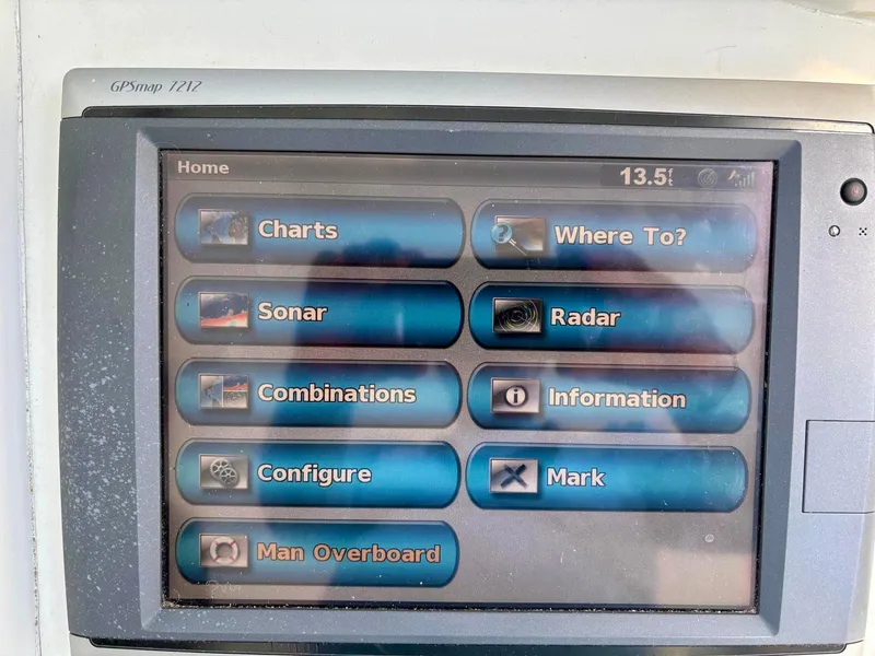 Slide: The Image of GPS navigation screen on a 1991 Hatteras 52 Cockpit Motor Yacht displaying various marine options. - 37