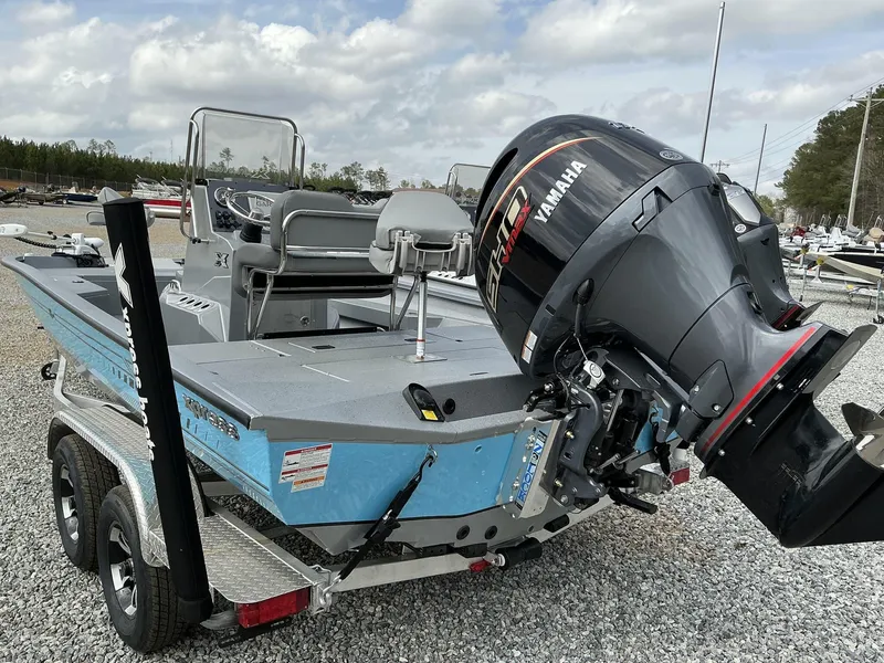 Slide: The Image of 2025 Xpress Hyper-Lift Series H22B boat with Yamaha engine on a trailer. - 10