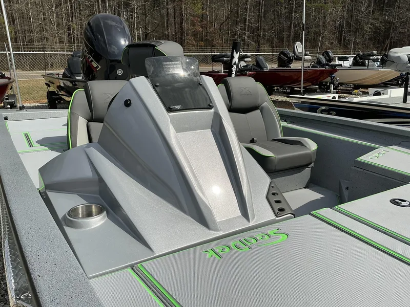 Slide: The Image of 2025 Xpress Hyper-Lift Bass Series boat with sleek design and comfortable seating. - 9