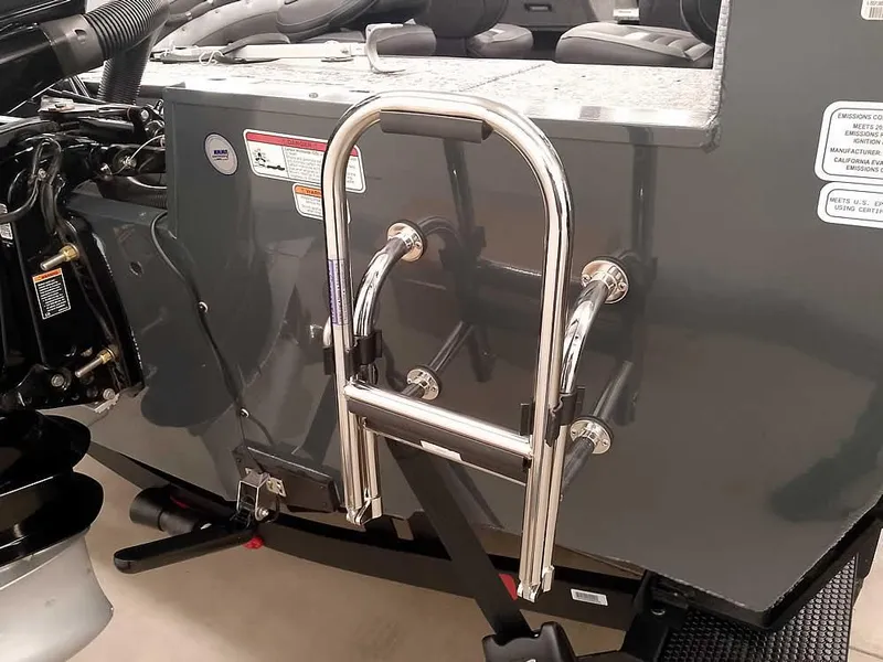 Slide: The Image of 2025 Ranger VX1988 WT boat with stainless steel ladder and engine details. - 14