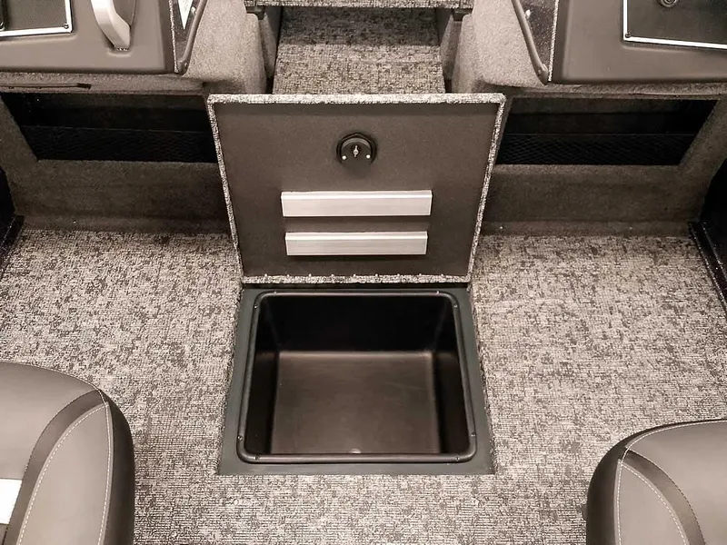 Slide: The Image of 2025 Ranger VX1988 WT boat storage compartment with open lid, showcasing interior space. - 17