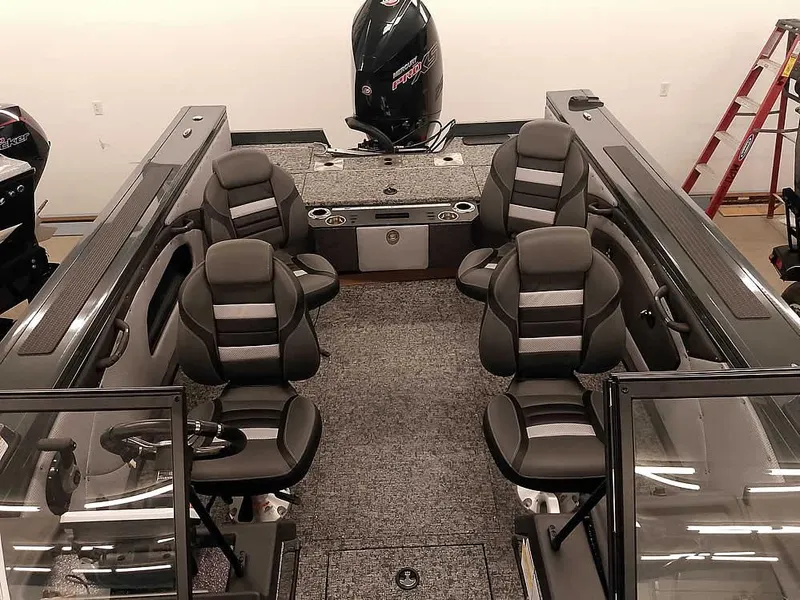 Slide: The Image of 2025 Ranger VX1988 WT boat interior with four seats and modern design. - 23