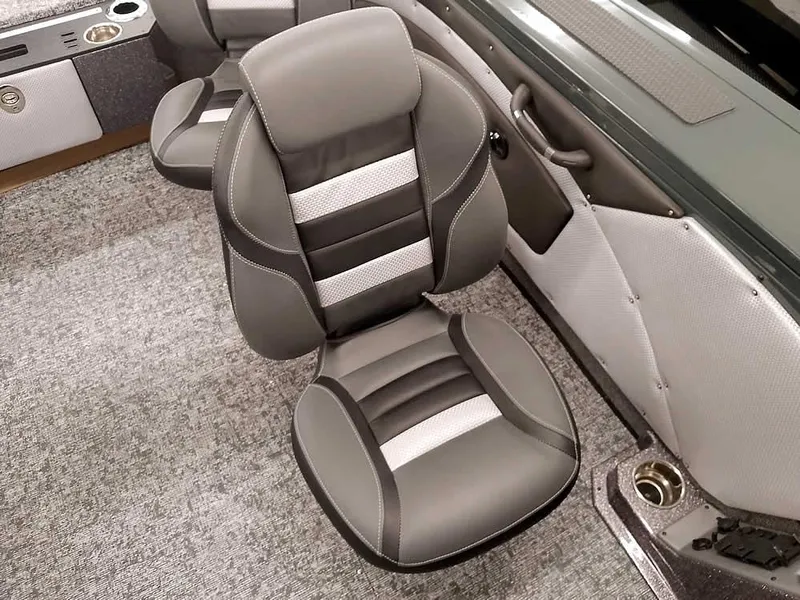 Slide: The Image of 2025 Ranger VX1988 WT boat interior with gray seating and carpeted flooring. - 24