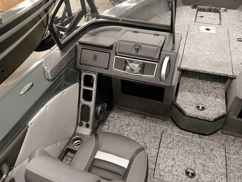 Slide: The Image of Interior of 2025 Ranger VX1988 WT boat with modern seating and dashboard design. - 25