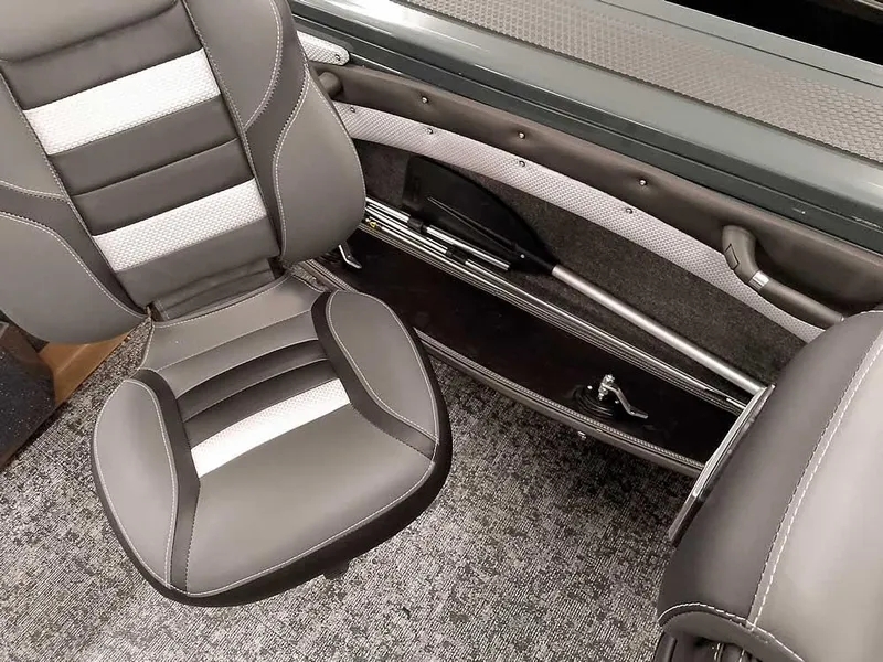 Slide: The Image of Ranger VX1988 WT 2025 boat interior with gray seating and storage compartment. - 36
