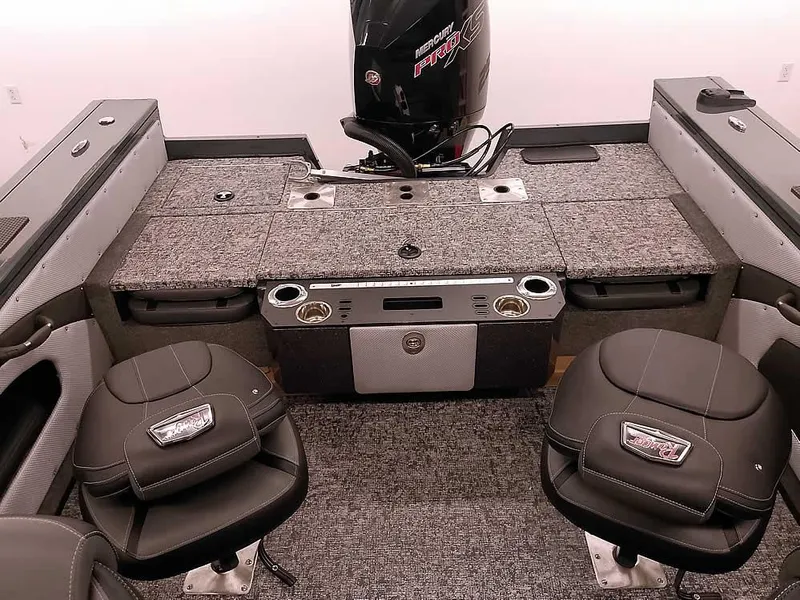 Slide: The Image of 2025 Ranger VX1988 WT boat interior with dual seats and motor, featuring modern design and functionality. - 37