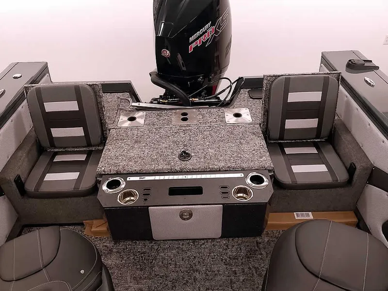 Slide: The Image of 2025 Ranger VX1988 WT boat interior with seating and Mercury engine. - 38