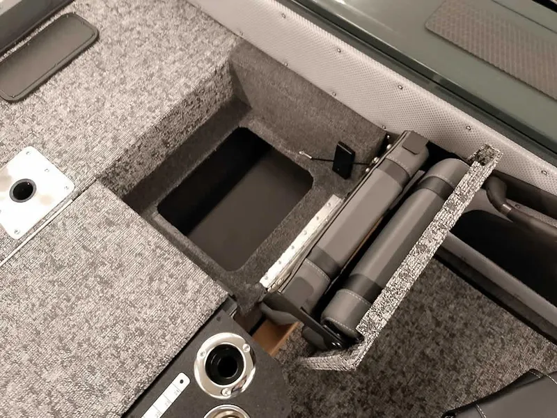 Slide: The Image of Interior of 2025 Ranger VX1988 WT boat with storage compartments and seating. - 39