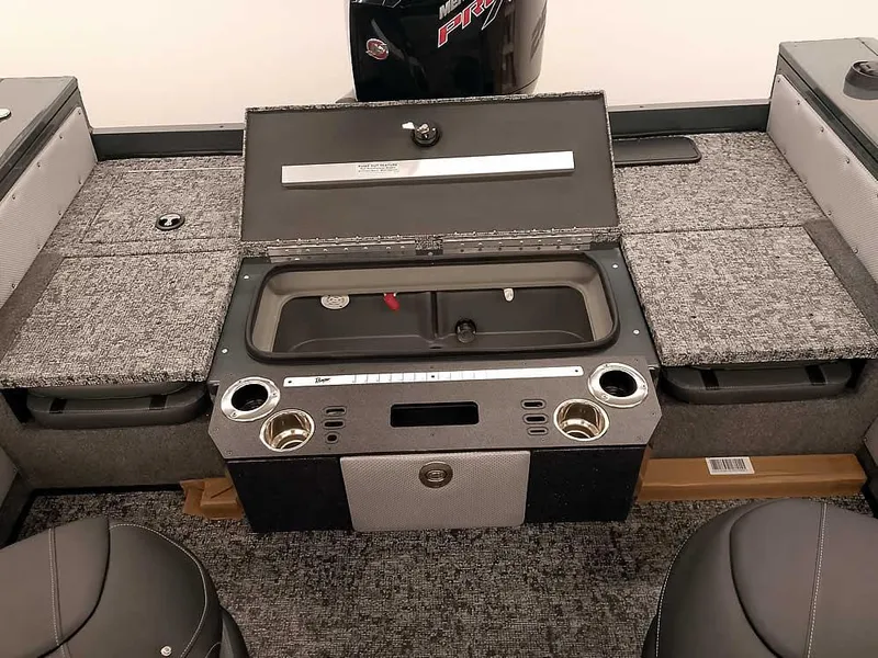 Slide: The Image of 2025 Ranger VX1988 WT boat interior with storage compartments and cup holders. - 41