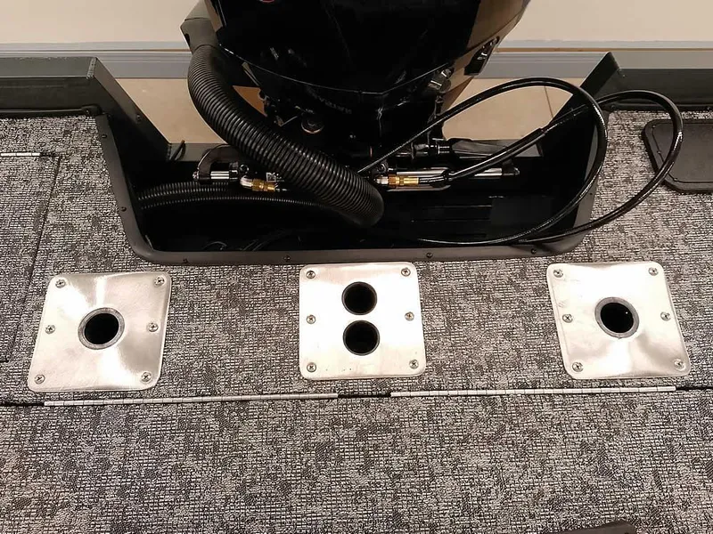 Slide: The Image of 2025 Ranger VX1988 WT boat interior with engine and mounting plates. - 42