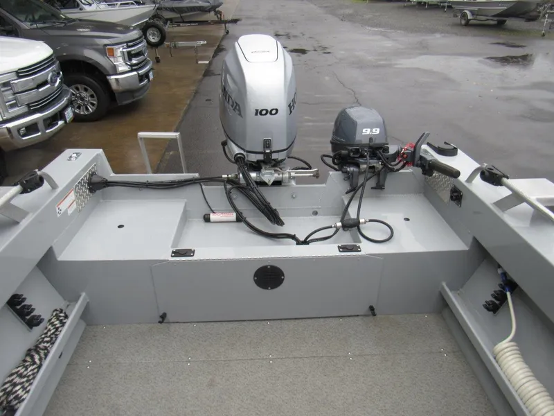 Slide: The Image of 2019 Hewescraft 200 Sportsman boat with dual Honda outboard motors. - 11