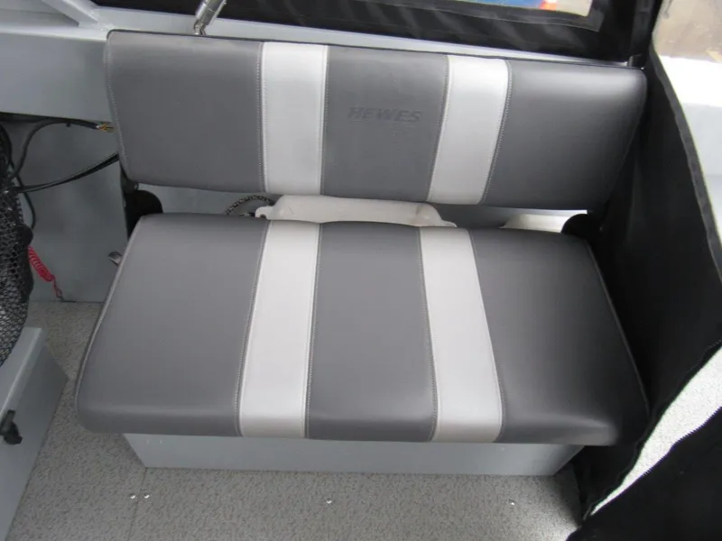 Slide: The Image of 2019 Hewescraft 200 Sportsman boat seat, gray with white stripes, interior view. - 16
