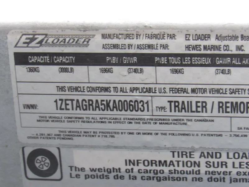 Slide: The Image of 2019 Hewescraft 200 Sportsman trailer label with capacity and VIN details. - 21