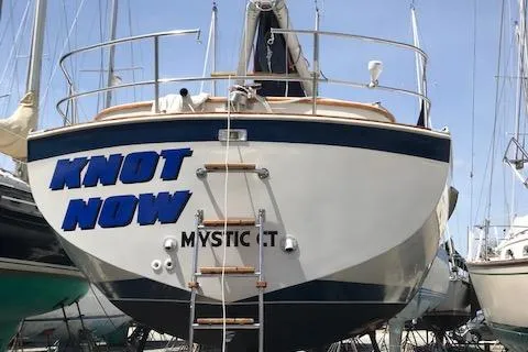 Slide: The Image of 1988 Nonsuch 33 sailboat named "Knot Now" in dry dock, Mystic, CT. - 2