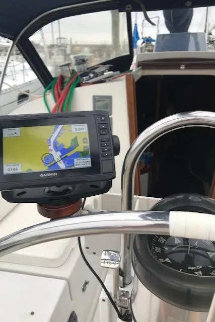 Slide: The Image of 1988 Nonsuch 33 sailboat cockpit with Garmin GPS and compass. - 5