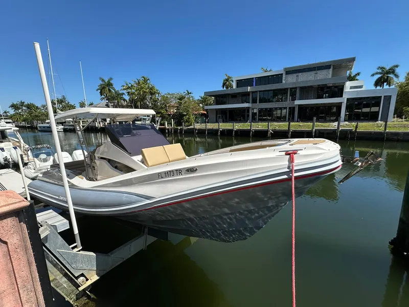 The Image of 2022 Zar Formenti 95 SL boat docked in a sunny marina setting. - 0