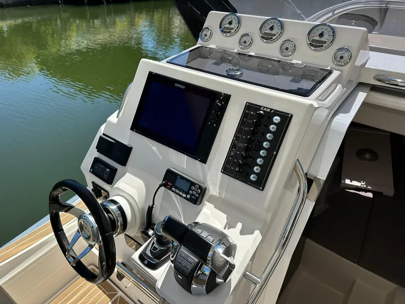 Slide: The Image of Control panel of 2022 Zar Formenti 95 SL boat with modern navigation equipment. - 2