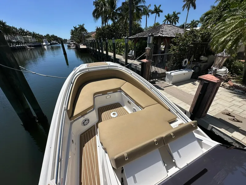 Slide: The Image of 2022 Zar Formenti 95 SL boat docked in a scenic canal setting. - 9