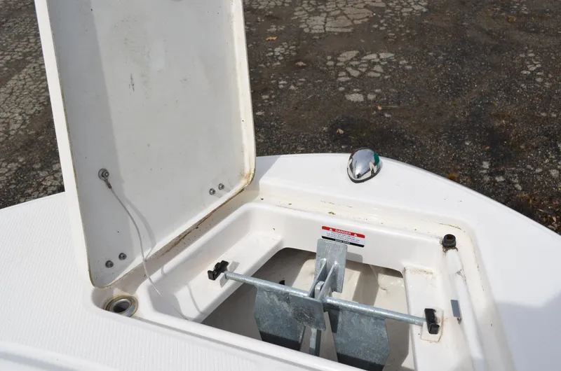 Slide: The Image of Open anchor compartment on 2018 Robalo R200 Center Console boat. - 11