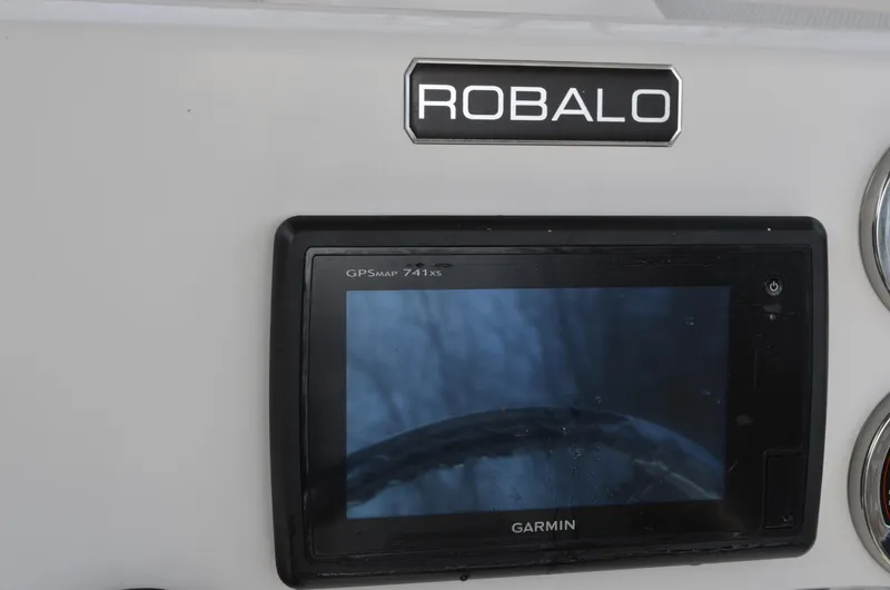 Slide: The Image of Control panel of 2018 Robalo R200 Center Console with Garmin GPS display. - 36